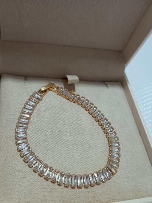 PULSEIRA RIVIERA BAGUETE - BANHO DE OURO.