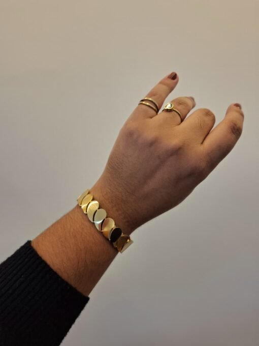 BRACELETE VIRGULAS - AÇ0 DOURADO.