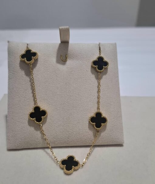 COLAR TREVO PRETO - AÇO DOURADO.